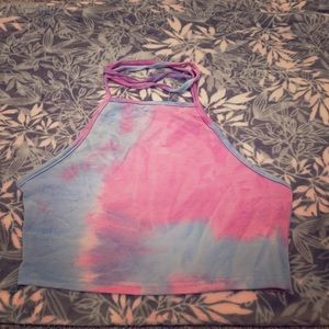 A tie dye crop top that ties behind the neck